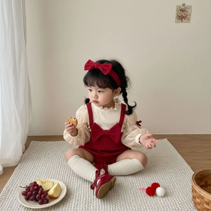 レッドビックリボンパフスリーブロンパース