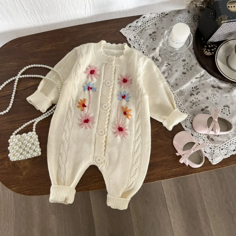 ベラ花刺繍フロントボタンニットロンパース