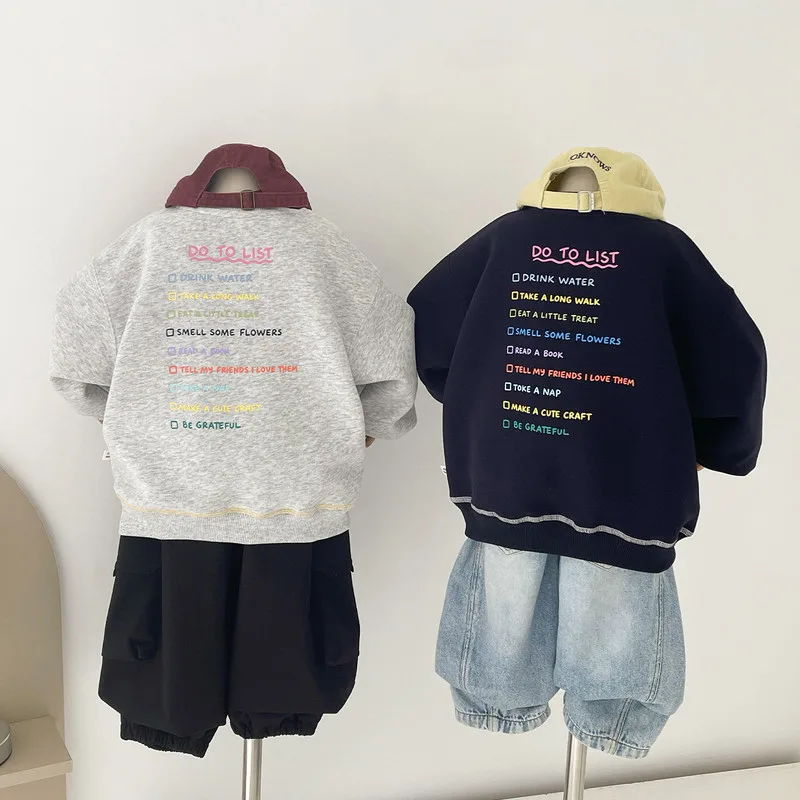 カラフル英字バックプリント配色ステッチトレーナー
