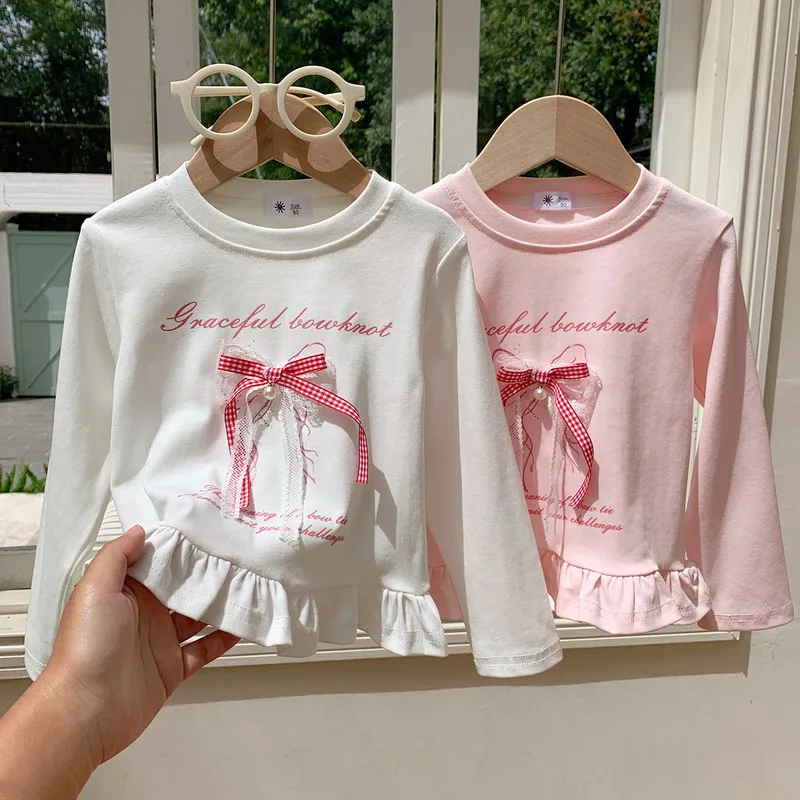 【KID】リボンモチーフフリル裾長袖Tシャツ