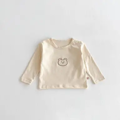 ベージュトップス