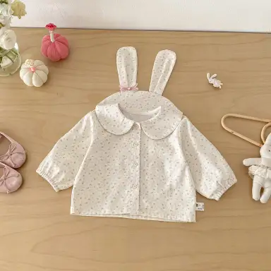 アイボリー トップス