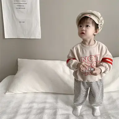 ベージュトップス