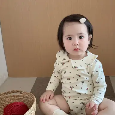 アイボリーフラワー柄ボディスーツ