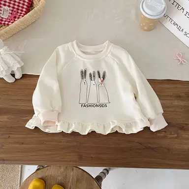 アイボリー トップス