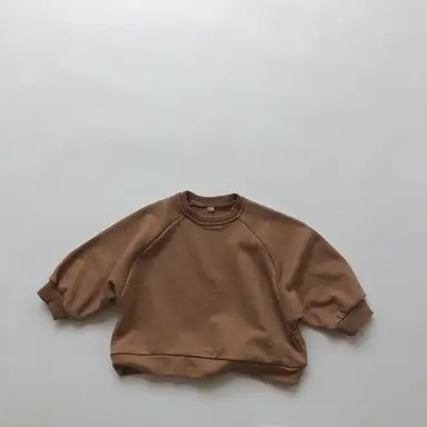 ライトブラウン トップス