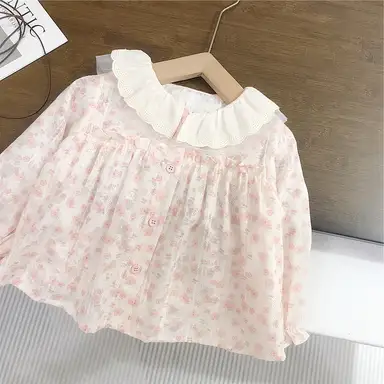 ピンク トップス