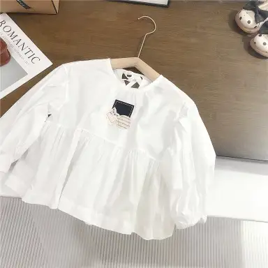 アイボリー トップス