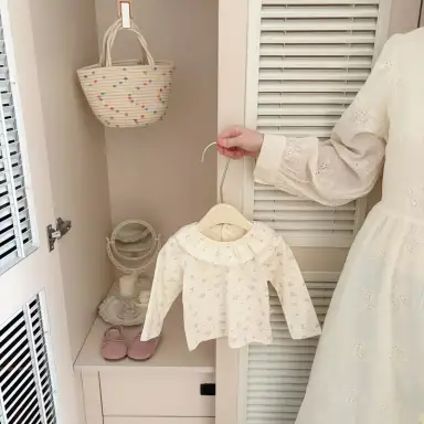 アイボリー トップス
