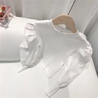 アイボリー トップス