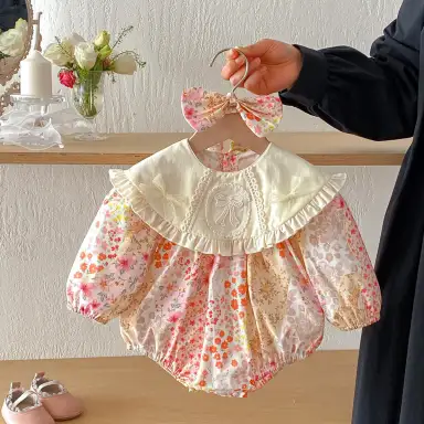 ピンク ロンパース