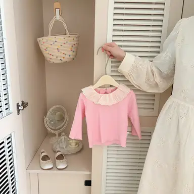 ピンク トップス