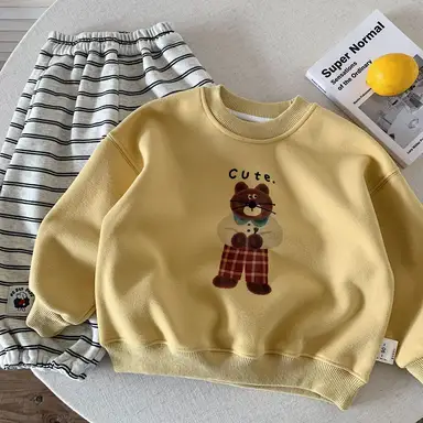イエロー トップス