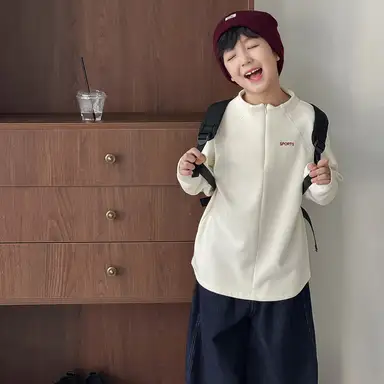 アイボリー トップス