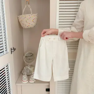 アイボリー パンツ
