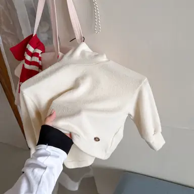 アイボリー トップス