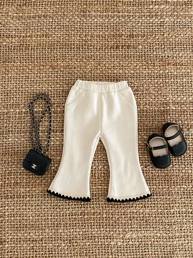 アイボリー パンツ