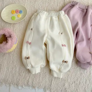 アイボリー パンツ