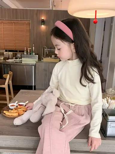 アイボリー トップス