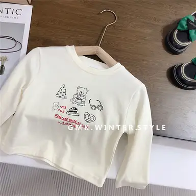 アイボリー トップス