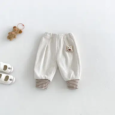 アイボリー パンツ