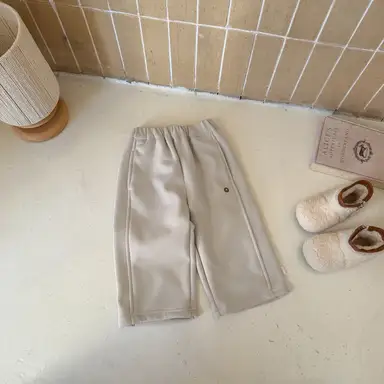アイボリー パンツ