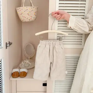 アイボリー パンツ