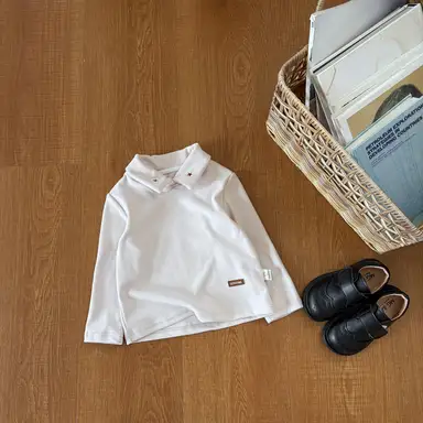 アイボリー トップス
