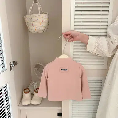 ピンク トップス