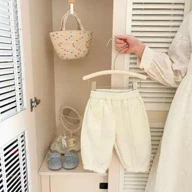 アイボリー パンツ