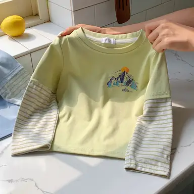 イエロー トップス