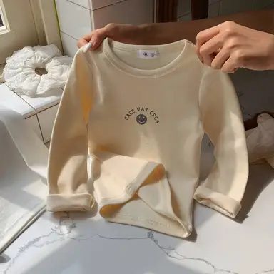 アイボリー トップス