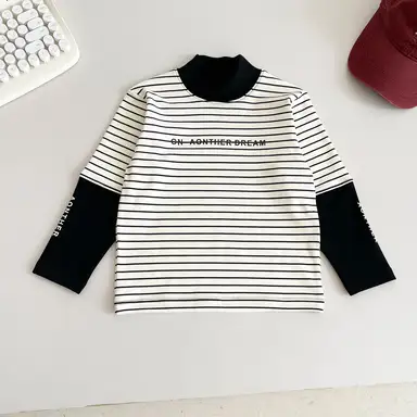 アイボリー トップス