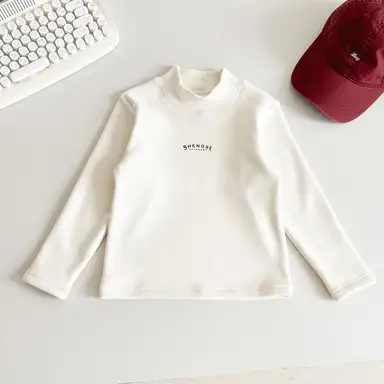 アイボリー トップス