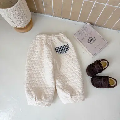 アイボリー パンツ