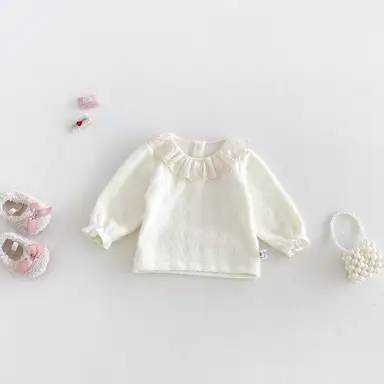 アイボリー トップス