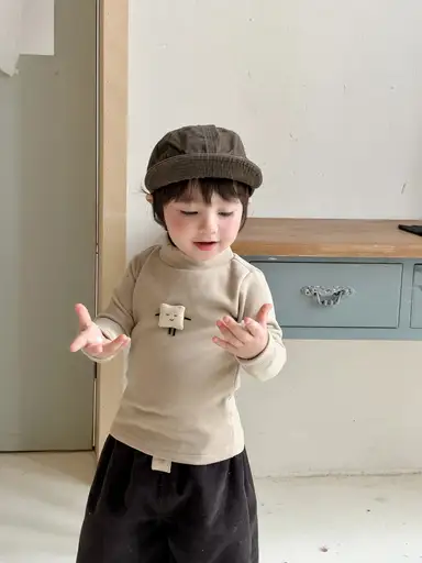 ベージュ トップス
