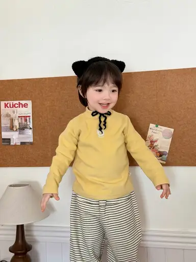 イエロー トップス