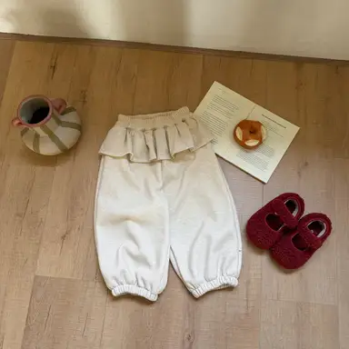アイボリー パンツ